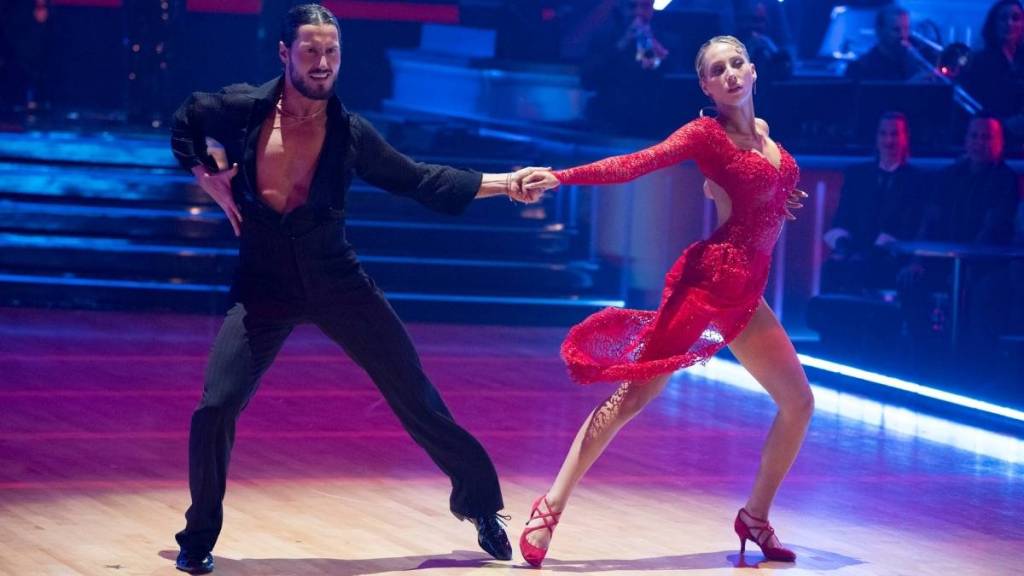 Alix Earle's Toned Legs Are Unmissable in High Slit Dress