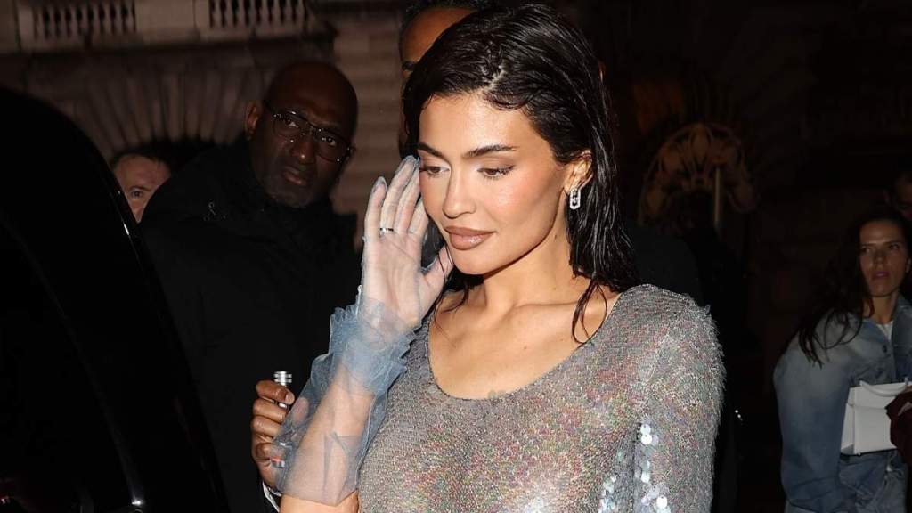 Kylie Jenner Poses While Showering in Silver Bikini