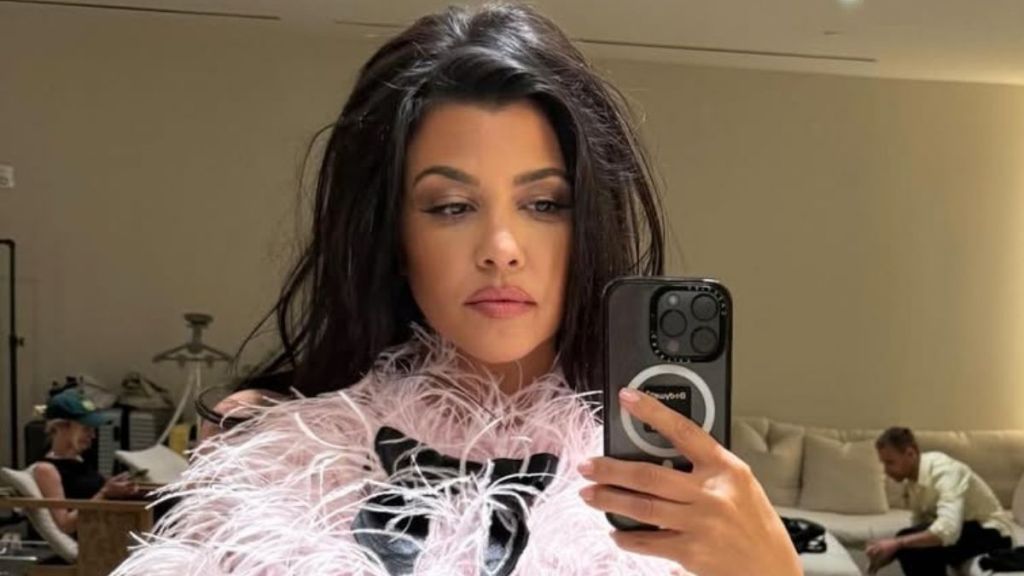 Kourtney Kardashian's Miniskirt Photos With Bold Lace Top