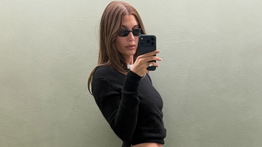 Photos: Bikini-Clad Hailey Bieber Balances Bag Over Heels