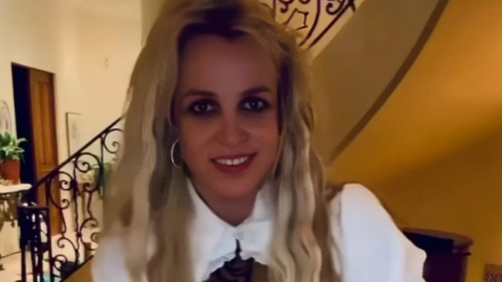 Britney Spears Flaunts Her Legs in White Dress