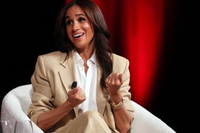 Meghan Markle in a tan suit sitting on stage at the 2025 TIME Summit