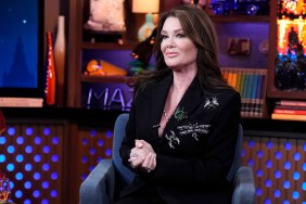 Lisa Vanderpump in a black suit with her hands folded on Watch What Happens Live