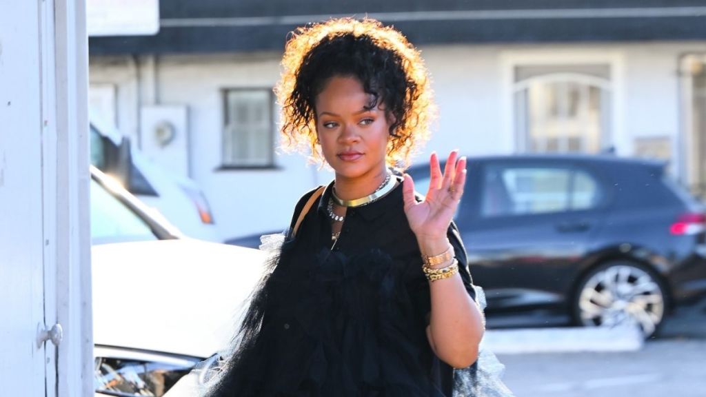 Rihanna Can't Get Enough of Her Lip Glosses in Fenty Beauty Video