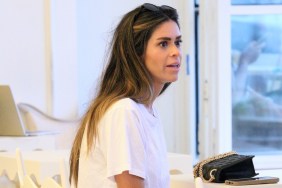 Taylor Frankie Paul in a white t-shirt, mouth agape, looking surprised