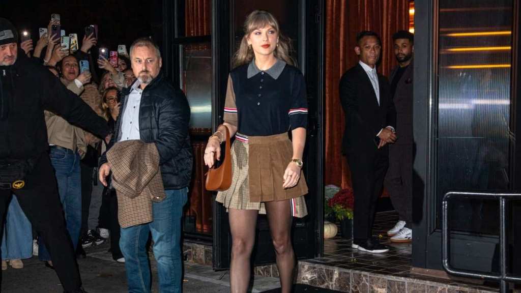 Taylor Swift Feels 'So High School' in Miniskirt Photos