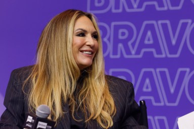 Kate Chastain smiling on stage at BravoCon 2025