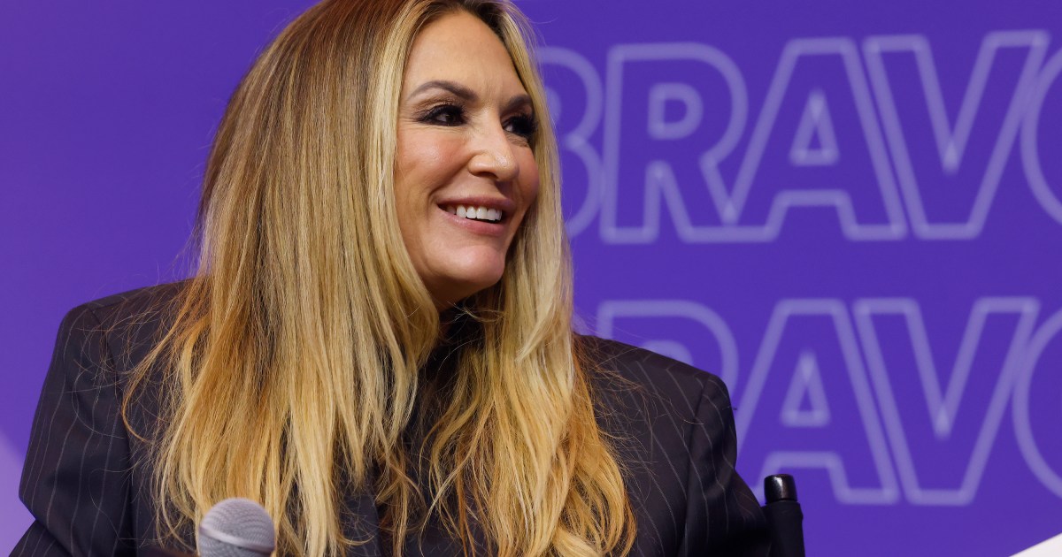 Kate Chastain smiling on stage at BravoCon 2025