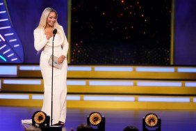 Karen Huger in a white gown on stage at BravoCon 2025