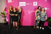 Gretchen Rossi and Jennifer Pedranti posing with fans, while Bronwyn Newport poses with a fans several feet away