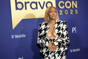 Drew Sidora in a houndstooth suit at BravoCon 2025