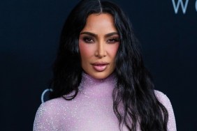 Kim Kardashian Looks Like Bond Girl in Sheer Purple Outfit