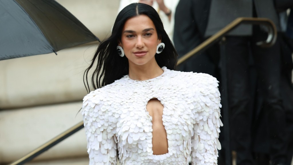 Dua Lipa Shows Off Her Dance Moves in Golden Bodysuit