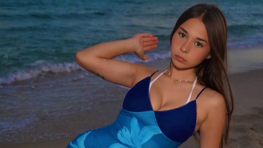 OnlyFans' Sophie Rain Turns Heads in Body-Hugging Dress