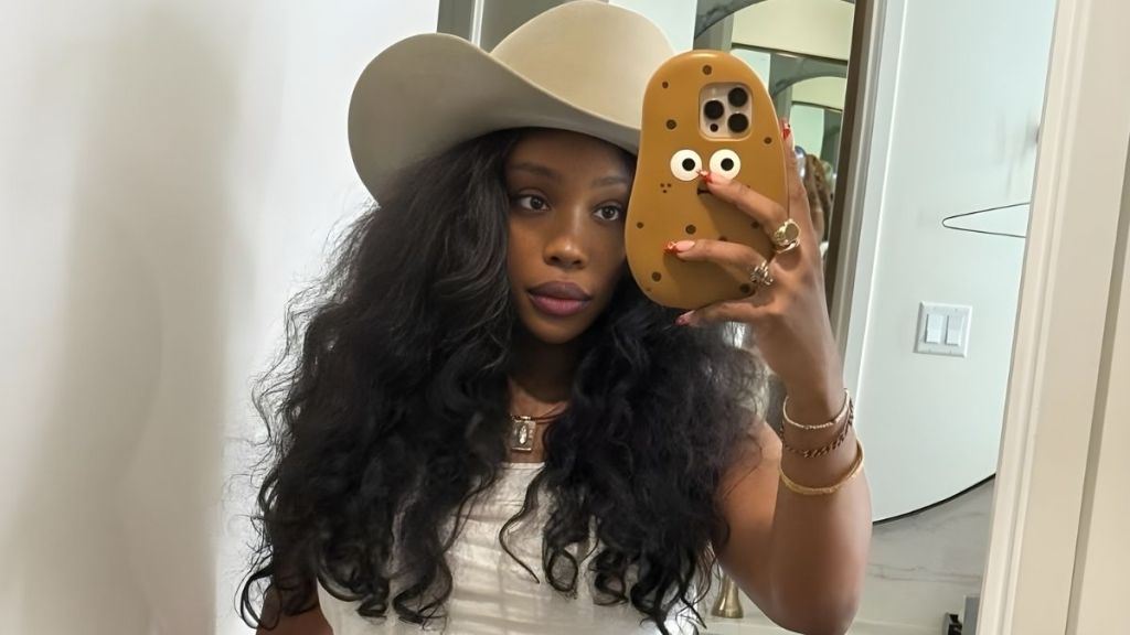 SZA Gets 'Arrested' in Fiery Red Bustier Top in New Video