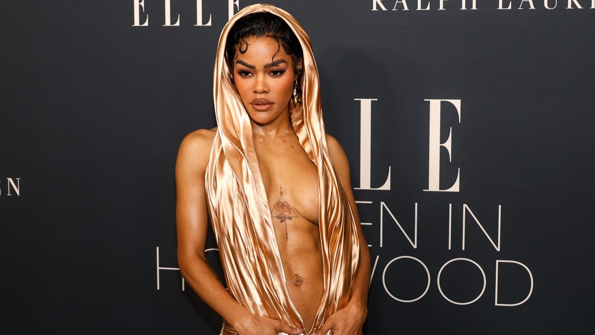 teyana taylor gold dress Teyana Taylor didn't just walk the Grammy Awards carpet  she shut it down.   From the flawless tailoring to the effortless confidence, every  detail screamed grown, creative, and untouchable. Teyana reminded