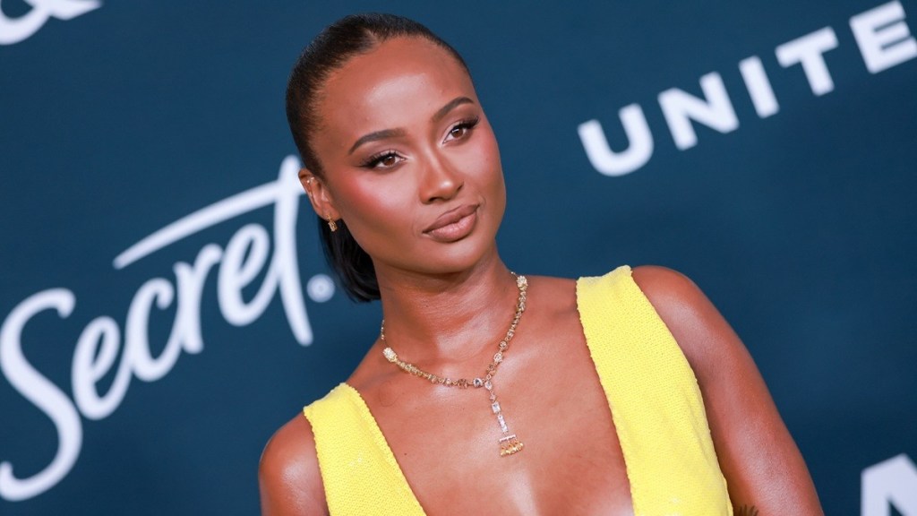 Travis Kelce's Ex Posing With Shaq in Bold Dress Is Must See