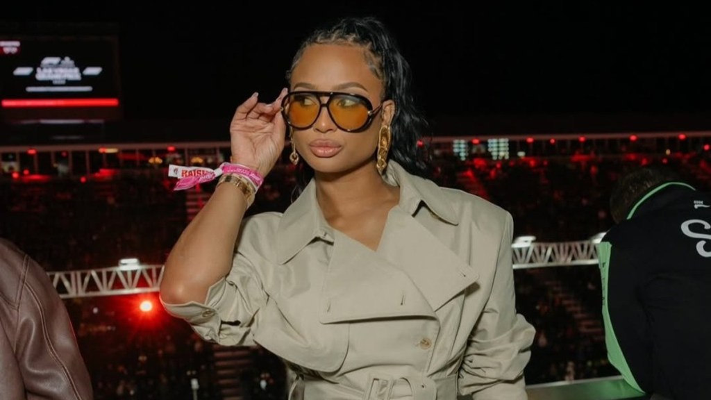 Travis Kelce's Ex Wearing Trench Coat Romper Is Must See