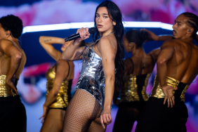 Dua Lipa’s Cheeky Bodysuit Photo Comes With Fishnet Stockings