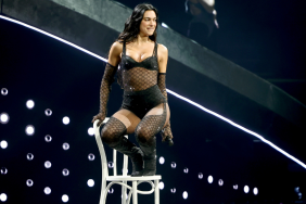 Dua Lipa's Black Minidress Features Cheeky Cutouts