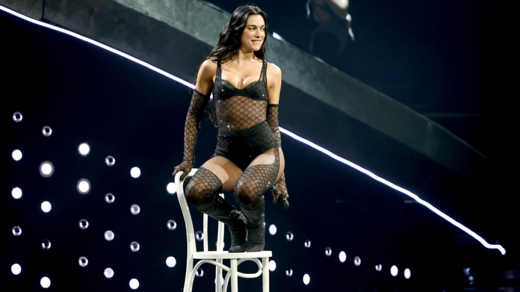 Dua Lipa's Black Minidress Features Cheeky Cutouts