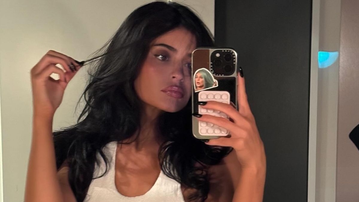 Kylie Jenner Poses on Grass in Only Fur Coat for Dreamy Photos