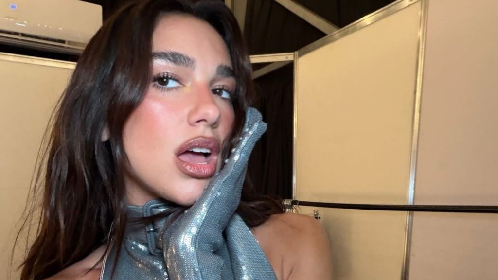 Dua Lipa's Silver Bodysuit Look Includes a Cheeky Addition