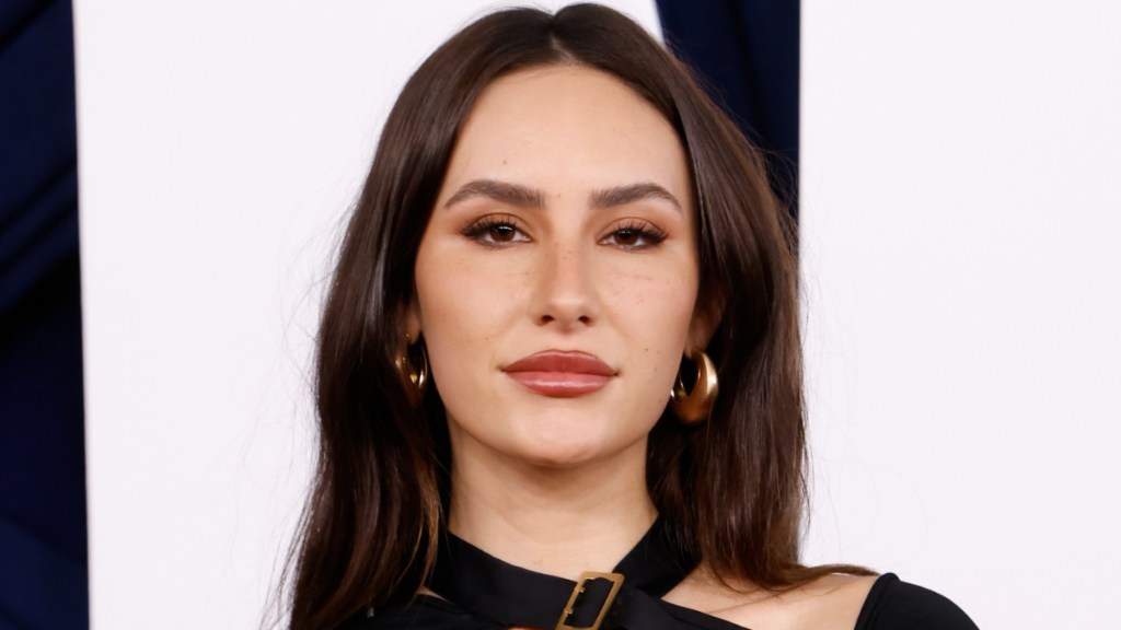 Ashtin Earle Turns Heads in Jacket With No Top