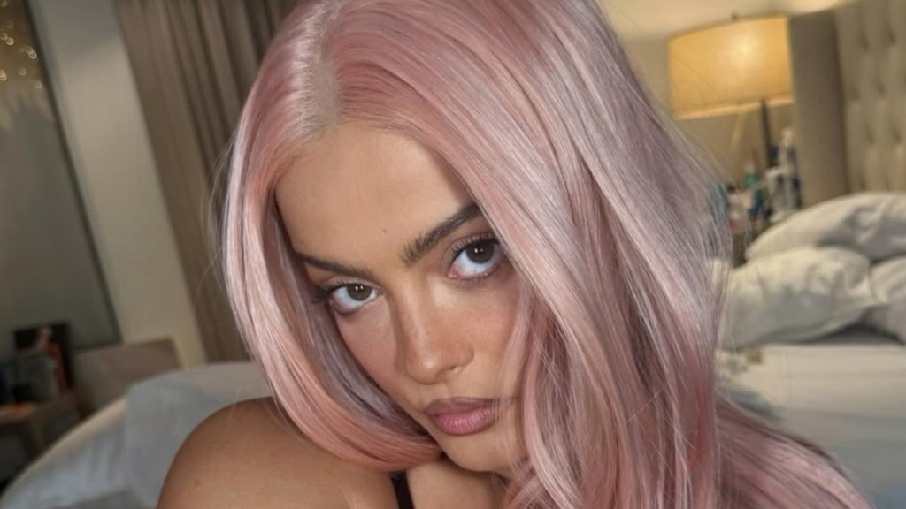 Bebe Rexha’s High-Slit Dress Exposes Lacey Lingerie