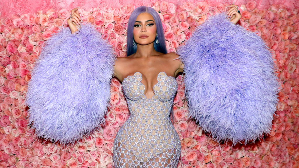 Kylie Jenner’s Feathery Conner Ives Dress Hangs on a Single String