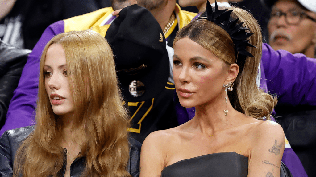 Kate Beckinsale Turns Heads in Strapless Dress & Boots at Clippers Game