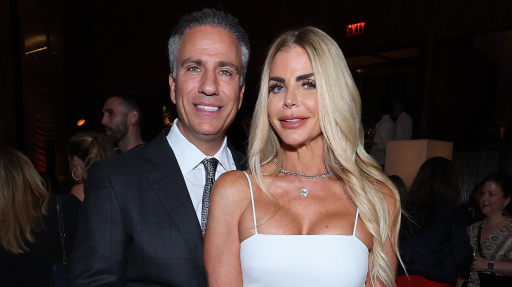 Alexia Nepola and Todd Nepola posing together at the NBC Upfronts