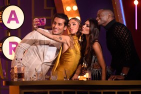 Joe Bradley, Maddi Reese, Grace Lilly, and Bradley Carter posing for a selfie on stage at BravoCon 2023