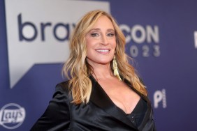 Sonja Morgan in a black blazer posing on the BraovCon red carpet