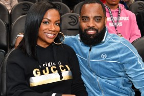 Kandi Burruss and Todd Tucker sitting courtside at an Atlanta Hawks game
