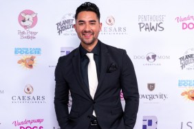 Marciano Brunette in a black suit and white tie at a Vanderpump Dogs event