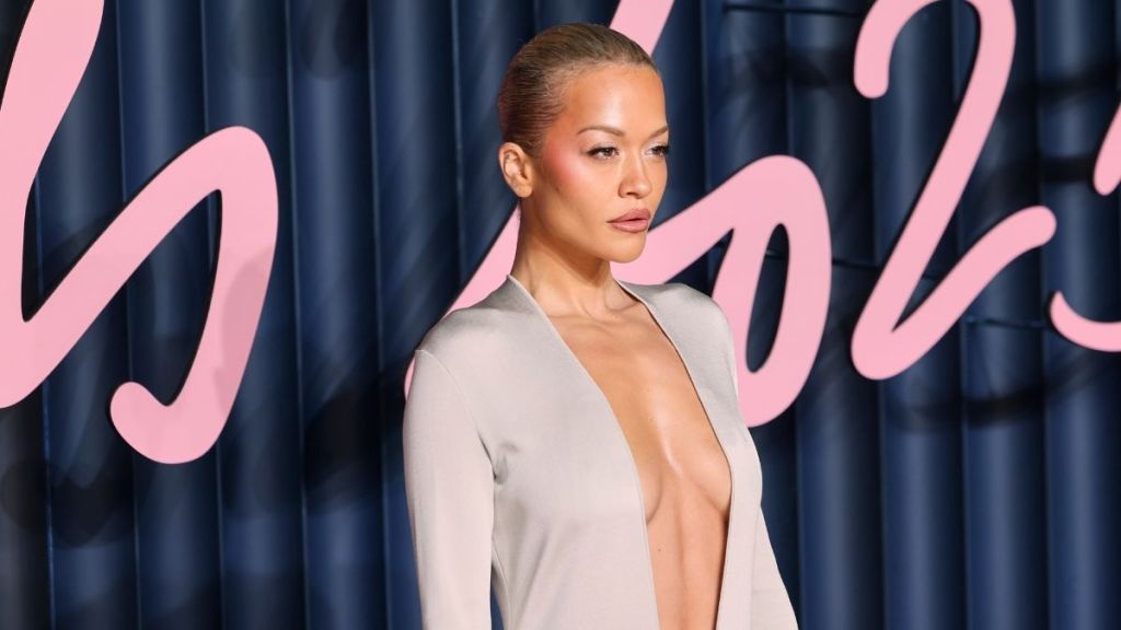 Rita Ora's Bold High Slit Dress Also Features Daring Neckline