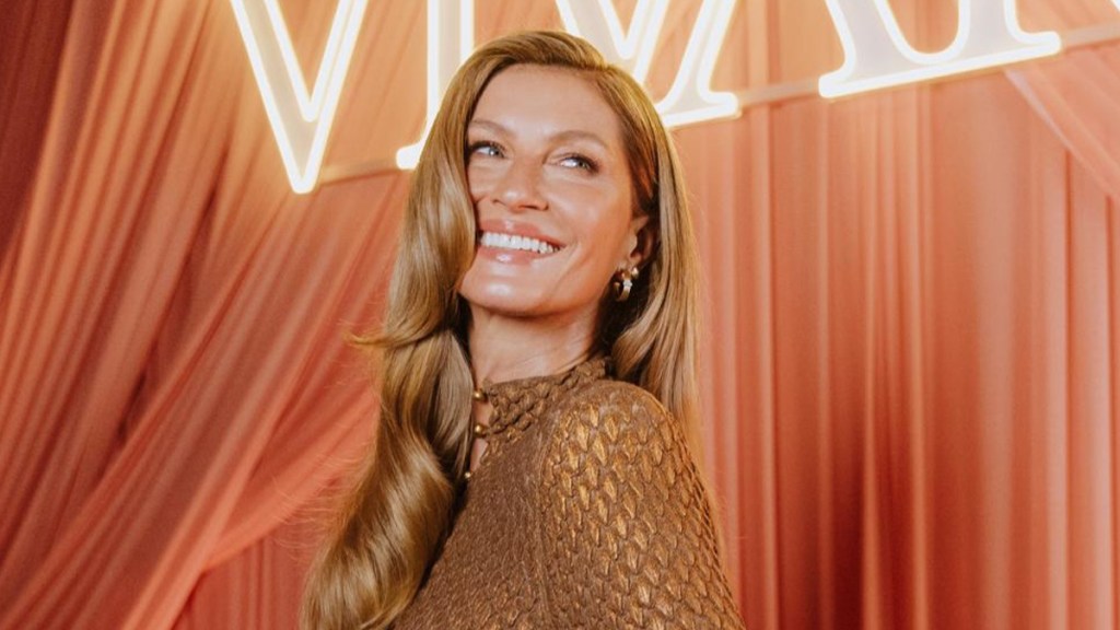 Gisele Bundchen Turns Heads in Body-Hugging Dress