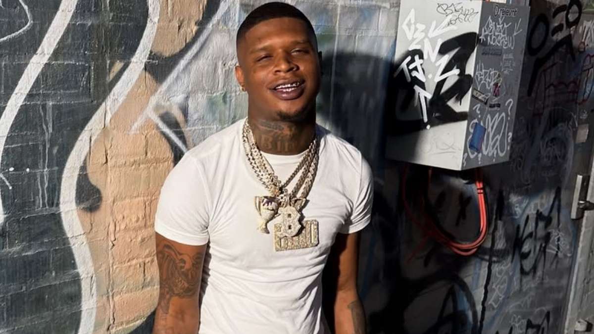 Rapper HoodTrophy Bino Posts Clip of Fan Sucking His Toes Onstage ...