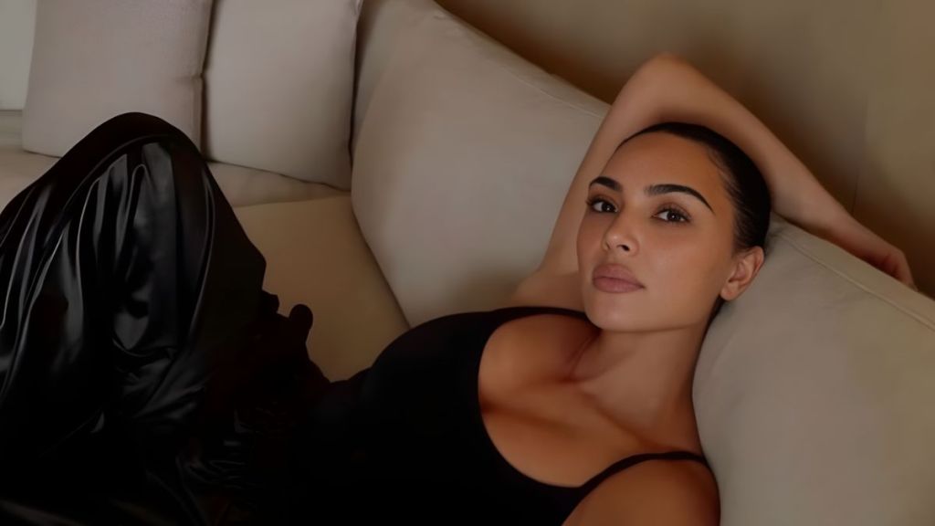Kim Kardashian Lying Down in Tank Top Demands Your Attention
