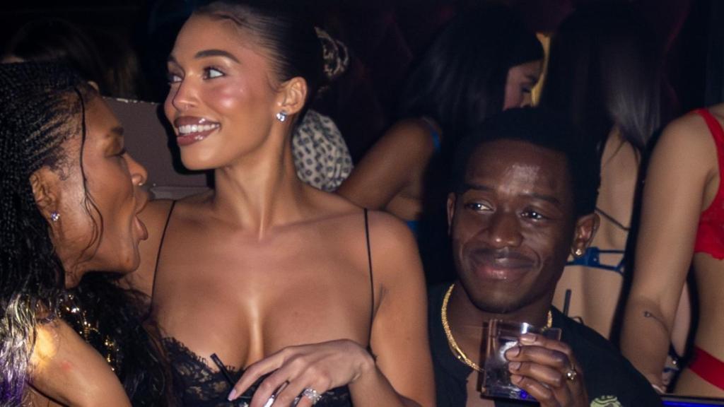 Lori Harvey Wears Sheer Lace Minidress & Sits on Damson Idris’ Lap