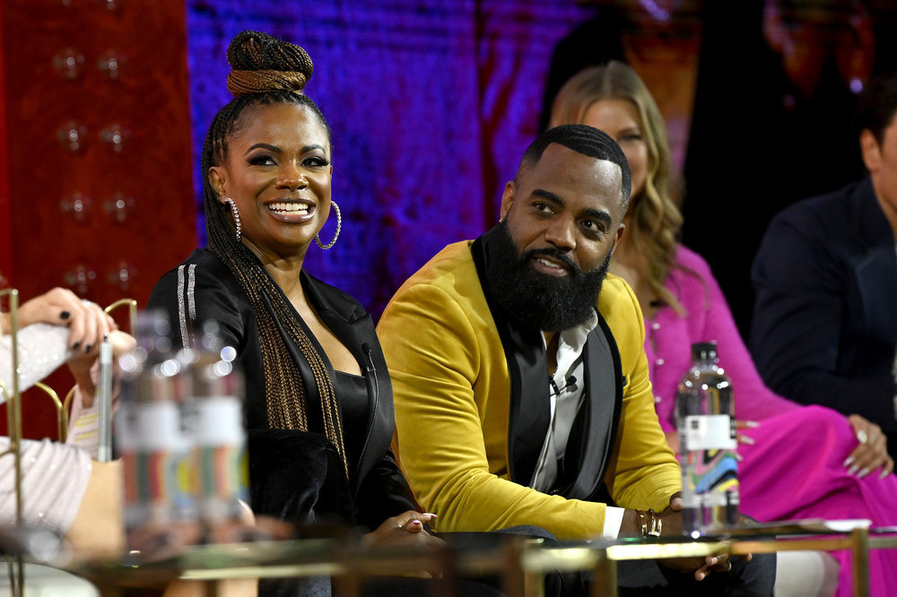 Kandi Burruss and Todd Tucker on stage at BravoCon 2022 