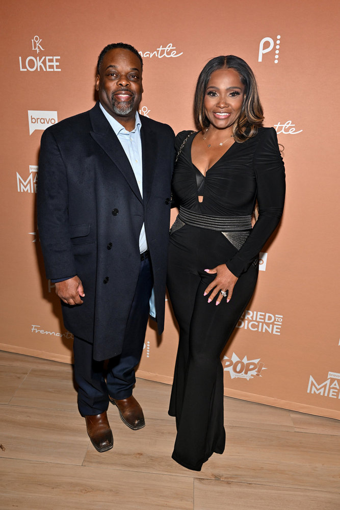 Dr. Heavenly Kimes and Dr. Damon Kimes dressed in black at the Married to Medicine Season 12 premiere party
