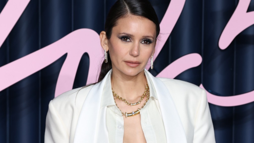 Nina Dobrev Turns Heads in Unbuttoned Shirt Look