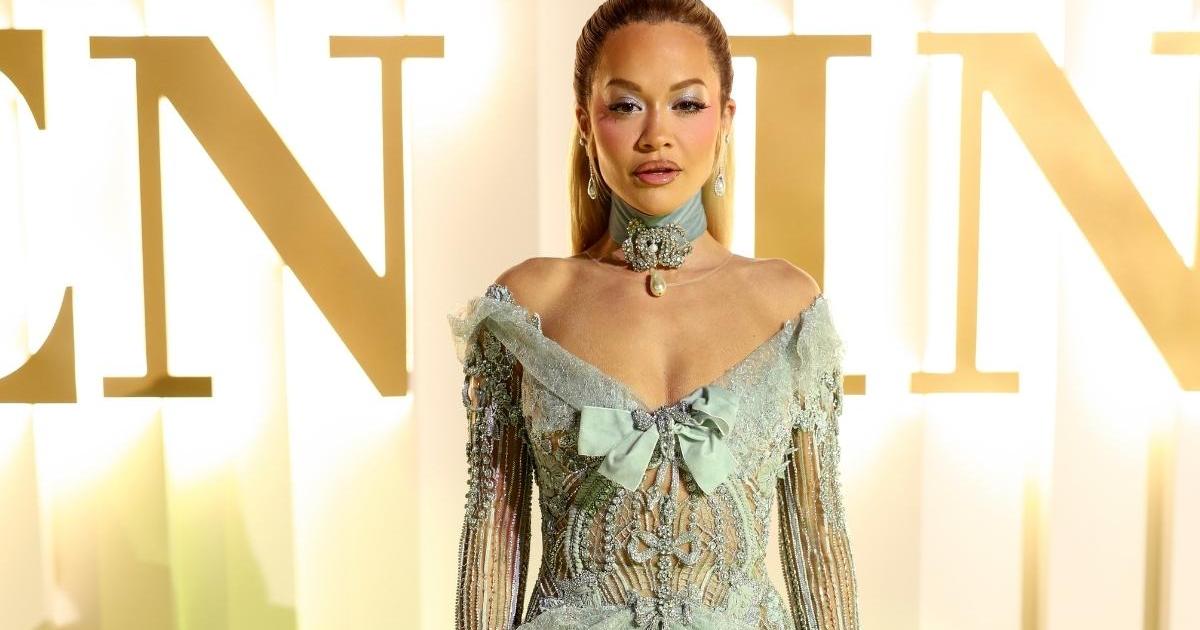 Rita Ora’s Fully Sheer Elie Saab Dress Features Flirty Lace & Bows