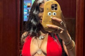 SZA’s Lingerie Corset Features Flirty Tie-up Detail in Photo