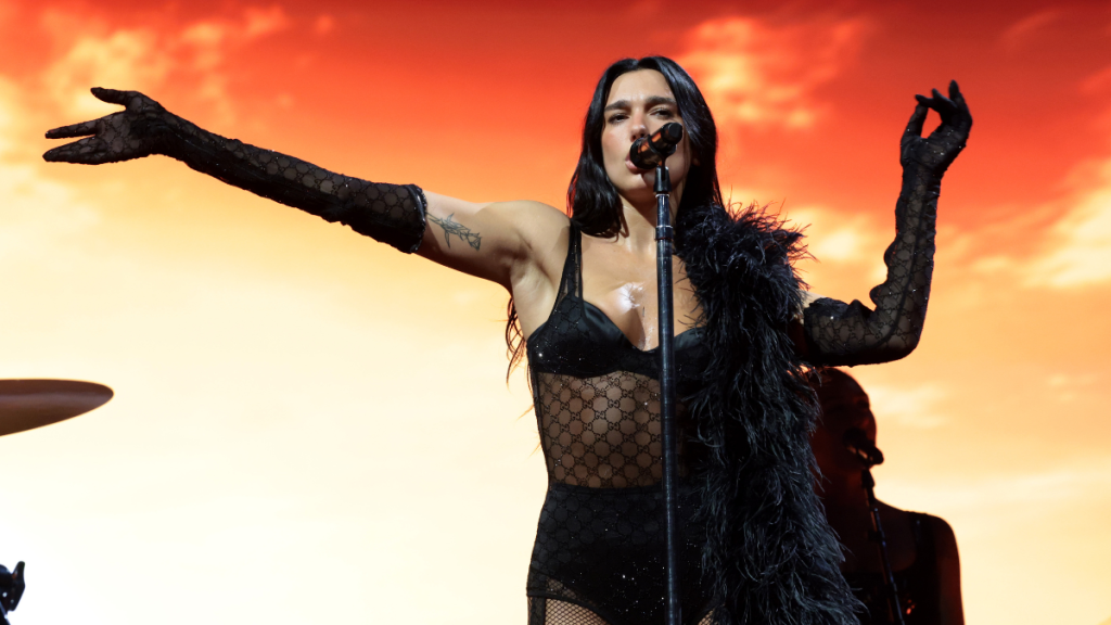 Dua Lipa’s Thong Peek in Sheer Gucci Monogrammed Dress Is So Good