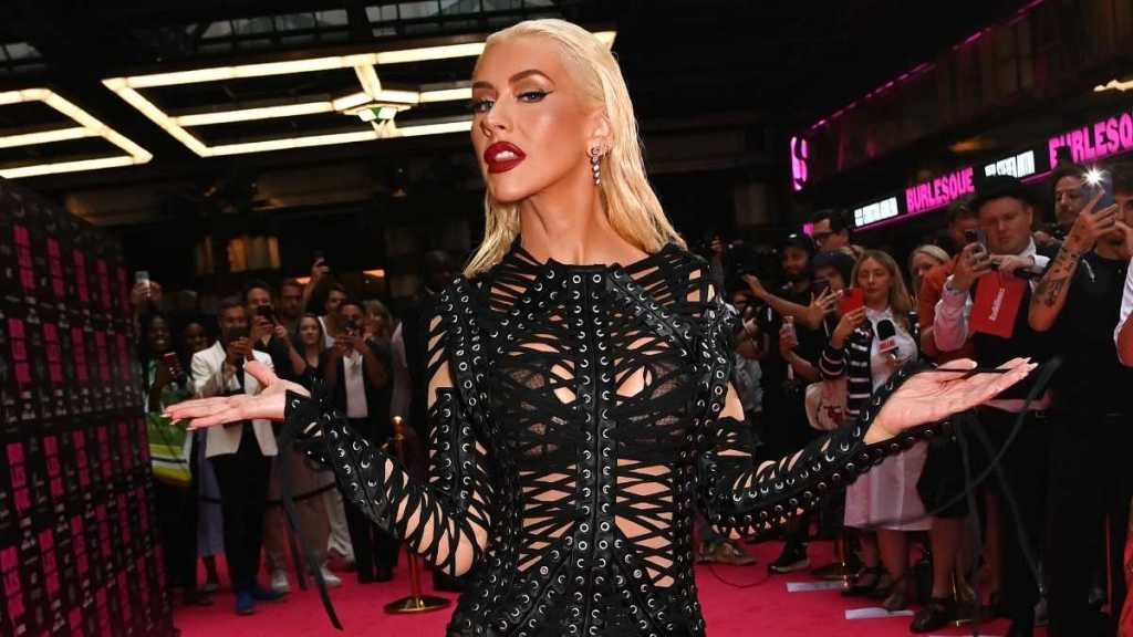 Christina Aguilera Fully Sheer Catsuit Photos Flaunt Cheeky Lingerie