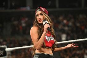 Nikki Bella’s Cooper DeJean Eagles Jersey Almost Slips in Video