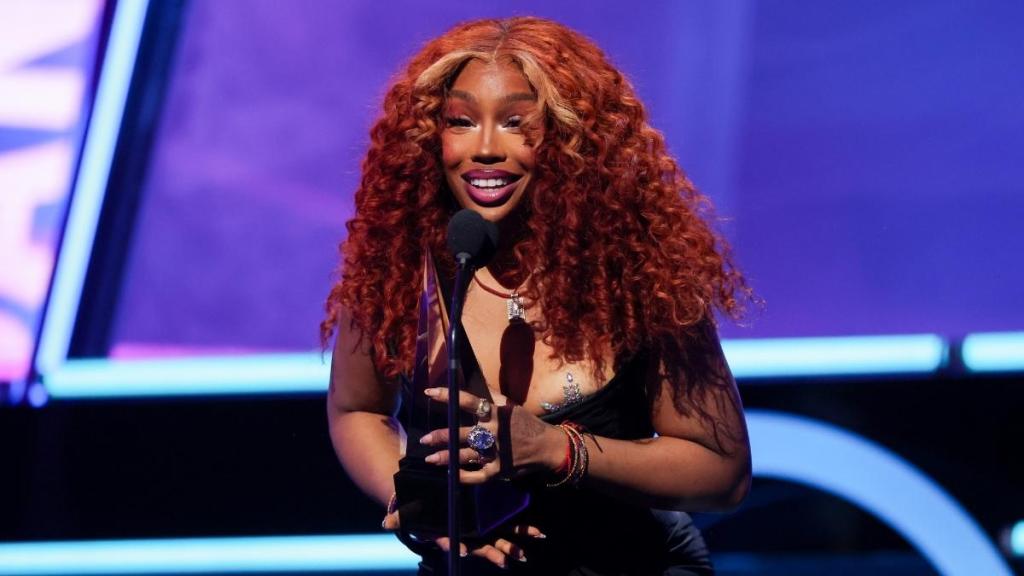 SZA Brings the Heat in a Bold Red Corset Look